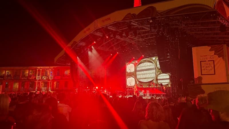 Public Service Broadcasting plating Spitfire on stage at the Piece Hall in Halifax