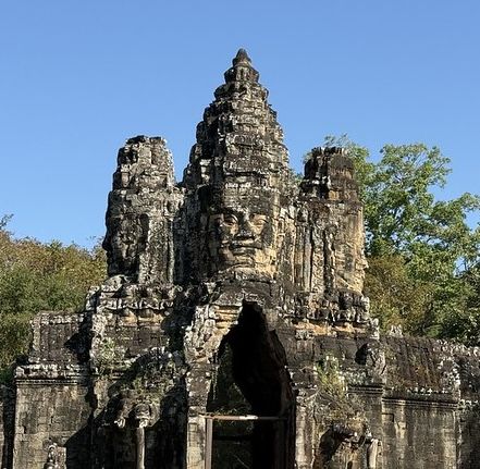 The four stone heads above the south gate of Angkor Thom city